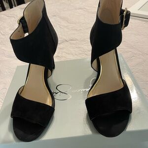 Black suede heels with gold buckle